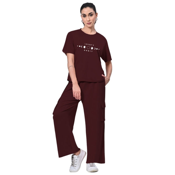 Women's cord set features a 'Lover's Orbit' crop top with moon phases, paired with eco-friendly Lyocell cargo trousers for a perfect blend of celestial charm and comfort. ✨🌙